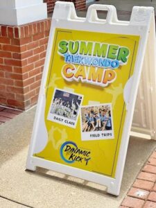 A-frame sign for Dynamic Kick Summer Taekwondo Camp, printed by Overflow Print