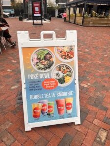 Plastic A-frame sidewalk sign printed by Overflow Print — Poke Bowl menu