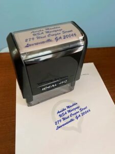 Self-inking address stamp made by Overflow Print