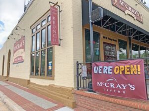 Outdoor vinyl banner printed by Overflow Print, McCrays Tavern